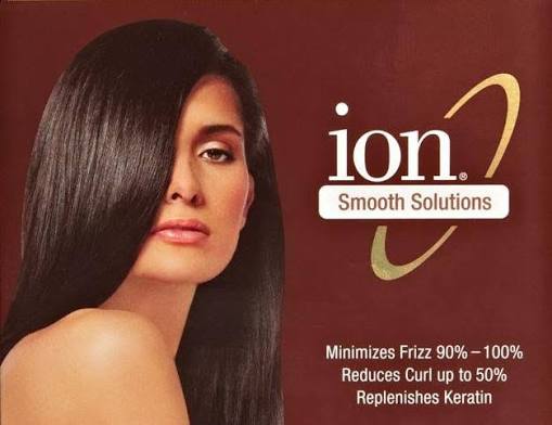 Keratin smoothing treatment being applied to hair